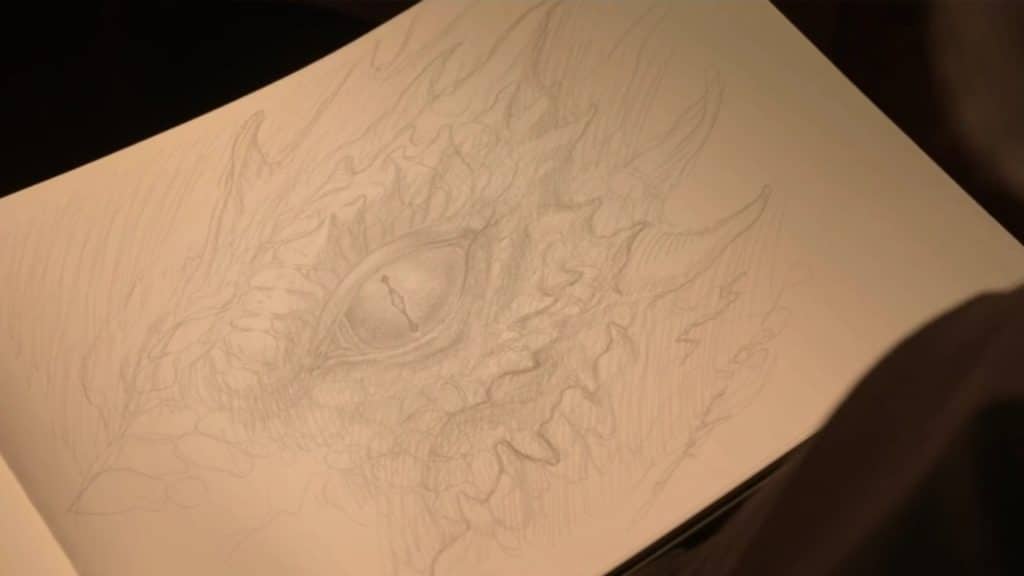 Ce dessin de John Howe représente un oeil de dragon.