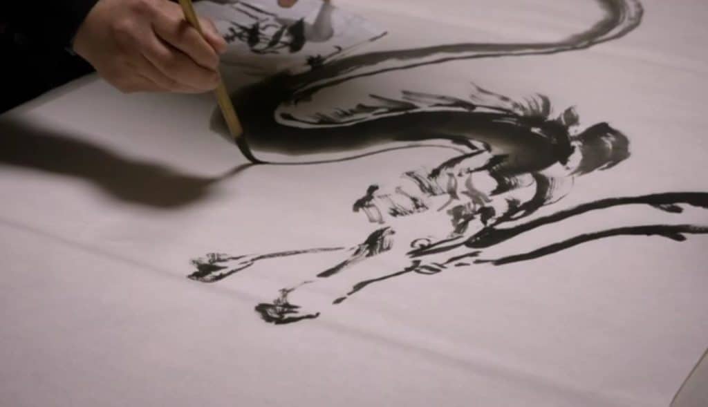 Il s'agit d'un dessin réalisé à l'encre qui représente un dragon chinois.